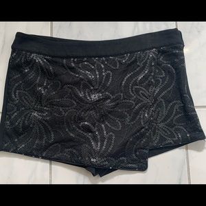 Forever 21 black skort. Sequin details in front.